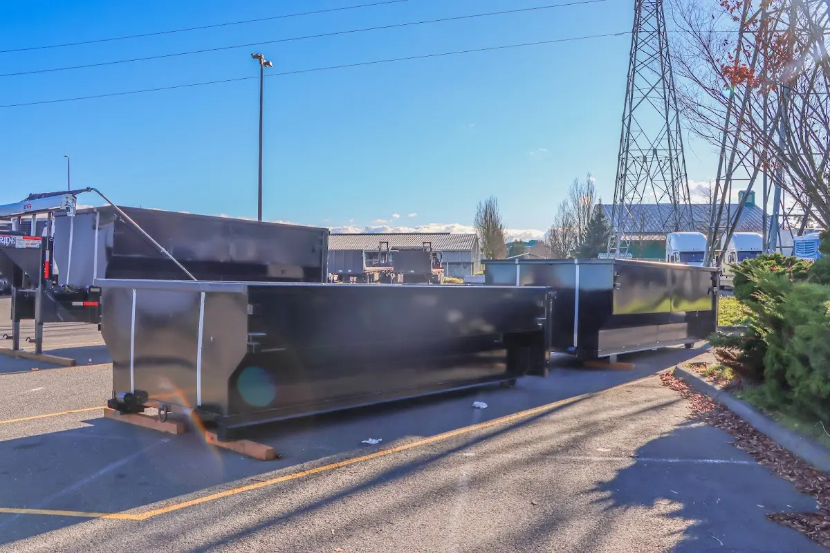 Roll-off dumpster ready for waste disposal at job site for 15 Yard Dumpster Rental in Waverly